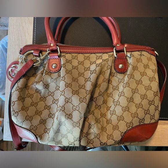 Gucci sukey rust colored leather and canvas purse
